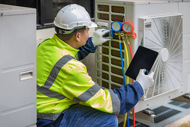 Professional Hvac technician working in Holly Springs, NC
